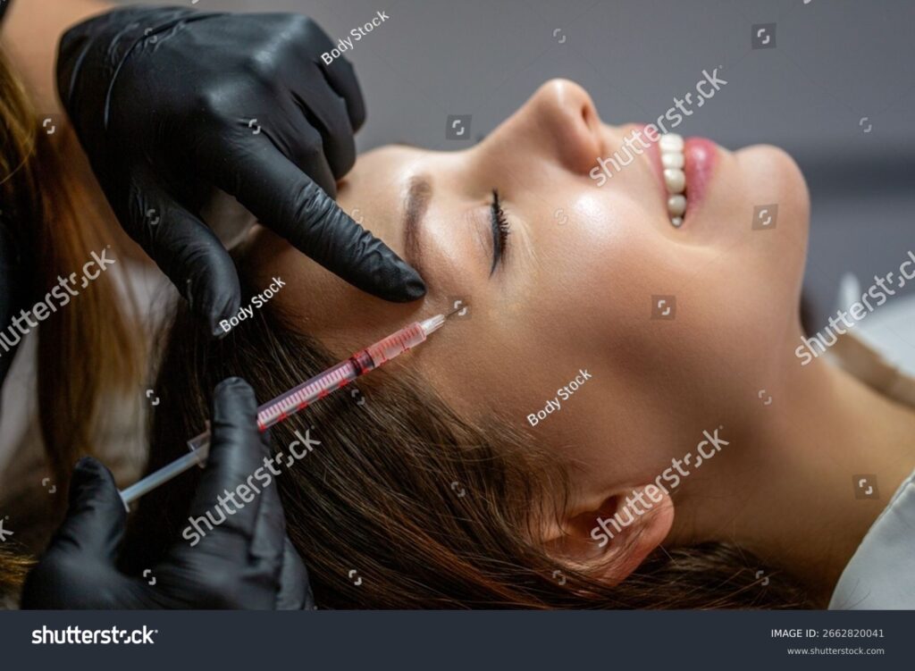 Lorem ipsum dolor sit amet consectetur adipiscing 1 Greenville Skin Dermatology and Cosmetics stock photo beautician injects toxin injections in the woman s temple woman on cosmetological procedures 2662820041 Greenville Skin Trusted Dermatologist in Greenville, SC | Medical & Cosmetic Skin Care
